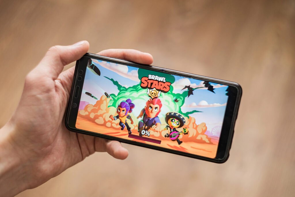 Game developer showing off mobile game called Brawl Stars