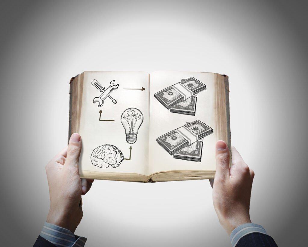 startup seed funding - man holding book with money illustrations