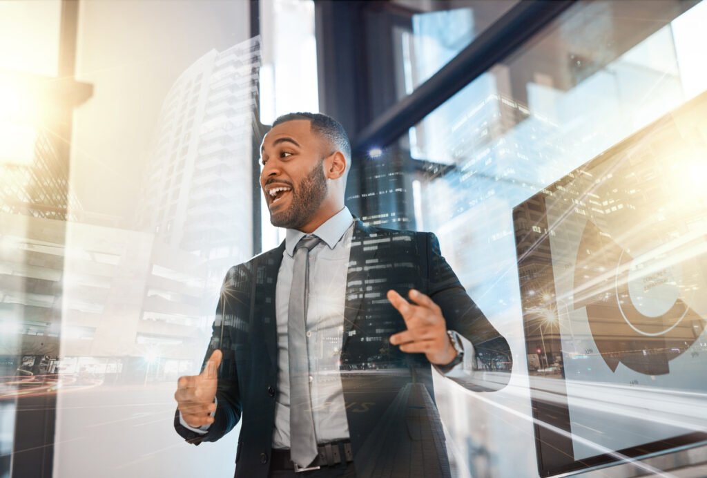 Businessman giving a company presentation using a computer to a group of investors.